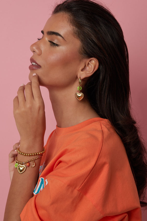 Earrings with colorful beads and detailed heart charm