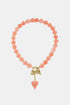 Bead necklace with hanging heart charms