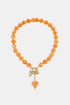 Bead necklace with hanging heart charms